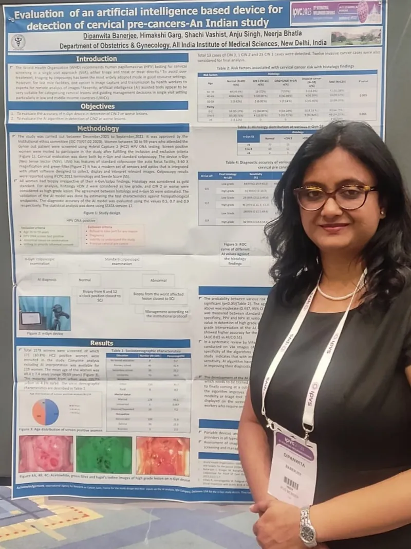Dr. Dipanwita Banerjee beside her research poster on an AI-based device for detecting cervical pre-cancers at IPVC 2023